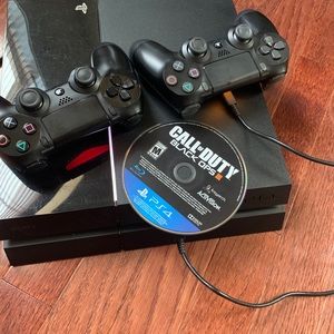 PS4 console with 2 controllers